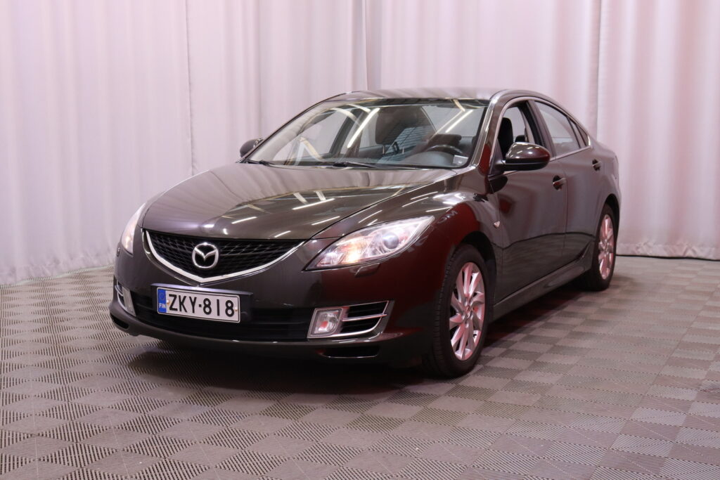 Mazda - 6 - Sedan 2,0 Touring Business 5AT 4ov UM1 // Kahdet renkaat ja Kahdet vanteet / Radio / Lohkolämmitin / Vakkari // Mazda - 6 - Sedan 2,0 Touring Business 5AT 4ov UM1 // Kahdet renkaat ja Kahdet vanteet / Radio / Lohkolämmitin / Vakkari // - Sedan